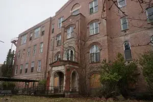 Abandoned St. Ignatius Hospital building in Colfax Washington featured in LiveSciFi haunted hospital investigation