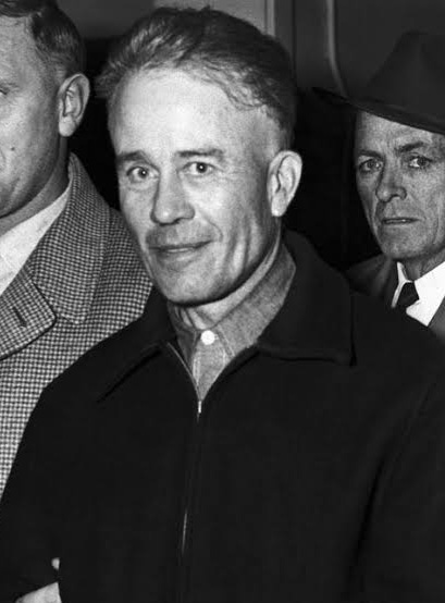 Archival black-and-white photograph of Ed Gein around 1958, murderer and grave robber from Plainfield Wisconsin